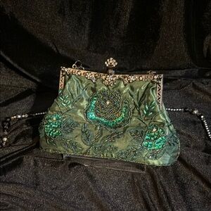Elegant Green Brocade Wristlet with Vintage Clasp